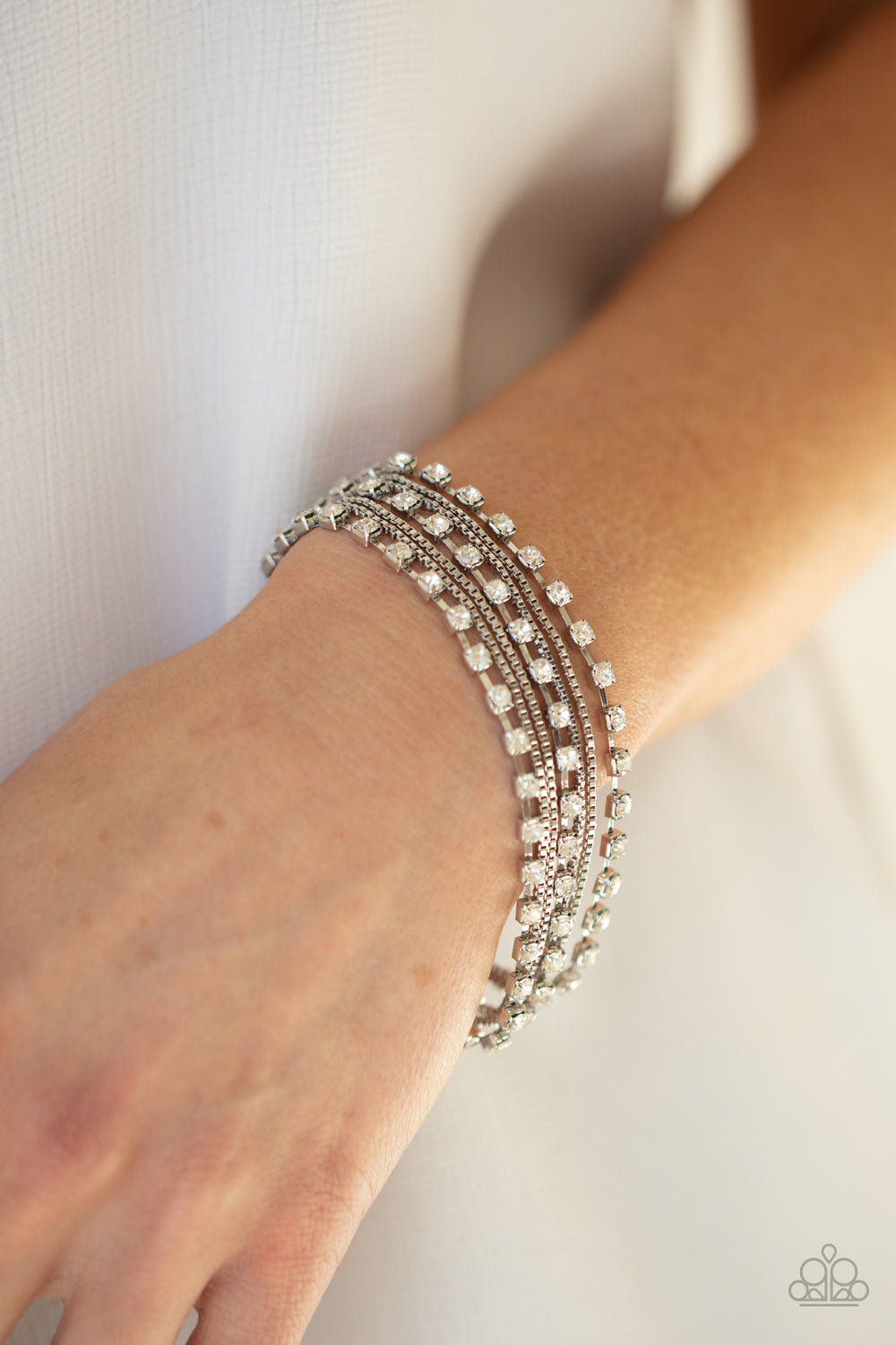 Paparazzi Thats a Smash! - White Rhinestone Bracelet - A Finishing Touch Jewelry